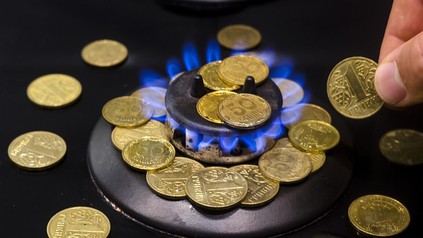 Geld auf einem Gasherd