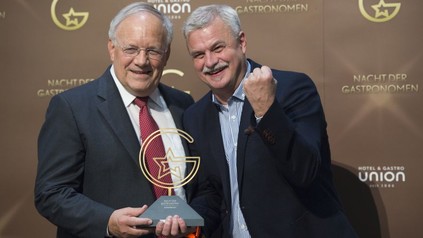 Johann Schneider-Amann und René Kaufmann mit dem Preis