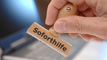 Ein Stempel mit dem Aufdruck Soforthilfen