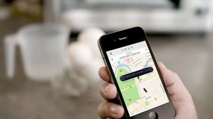Smartphone mit Uber App