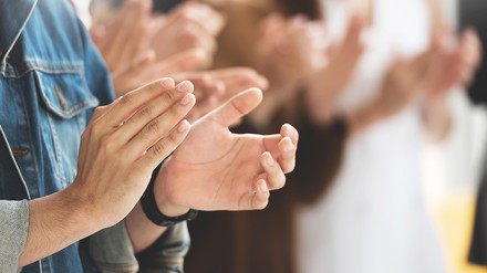 Applaudierende Menschen.