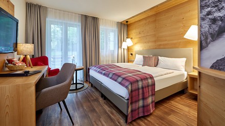 Das Berghotel Grainau mit einem Gästezimmer mit Ausblick