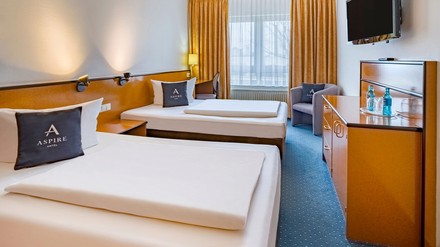 Ein Gästezimmer im Aspire Hotel Frankfurt Airport Rüsselsheim