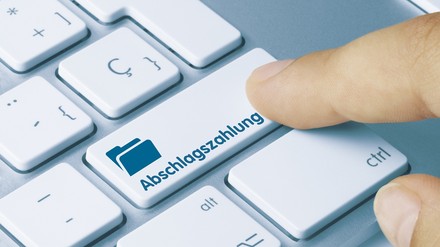 Tastaturknopf mit der Aufschrift „Abschlagszahlung“
