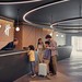 Familie mit Kindern an Hotelrezeption