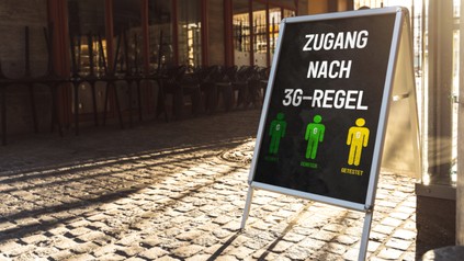 Sign outside a restaurant or cafe saying "Zugang nur nach 3G - Regel" Tested, Vaccinated or Recovered, Covid-19 Measure