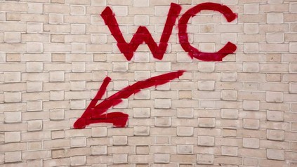 WC Graffiti auf Wand