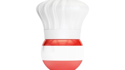 Ball mit Österreich Farben und Kochmütze