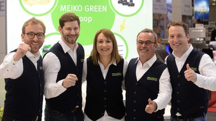 Das Team von Meiko Green Waste Solutions auf einer Messe vor dem Messestand