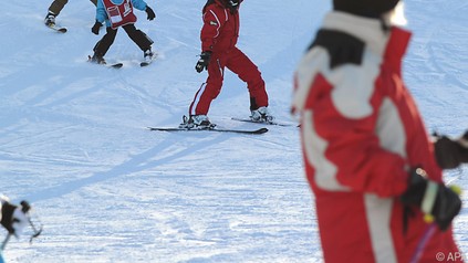 Skifahrer auf Piste