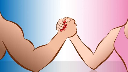 Mann und Frau beim Armdrücken