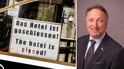 Jürgen Gangl, 1. Vorsitzender der Hoteldirektorenvereinigung Deutschland; Schild auf dem "Hotel geschlossen" steht