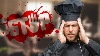 Koch mit Kopfschmerzen